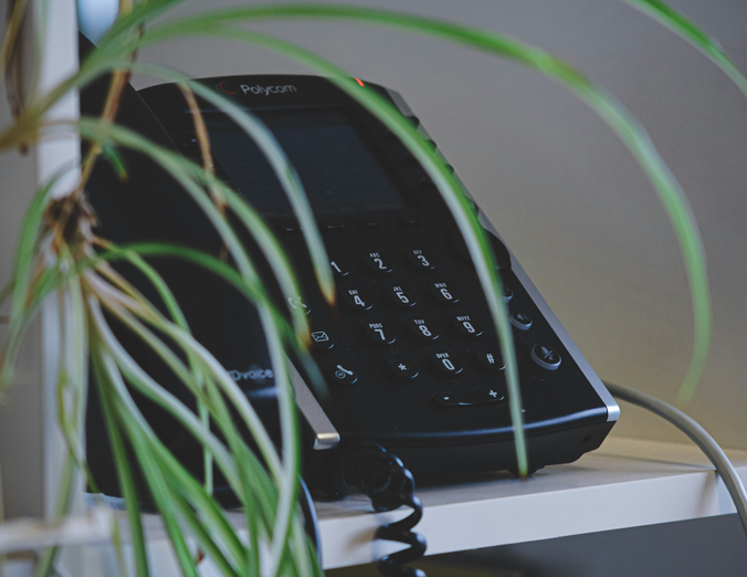 Network diagram showing SIP trunk connection between business phones and internet service